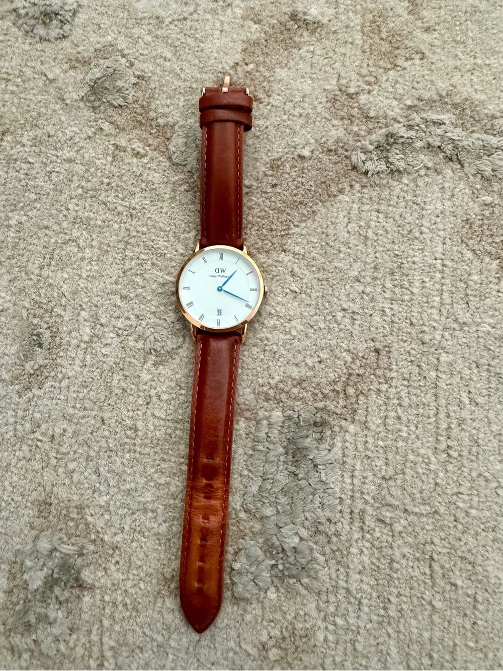 Daniel Wellington women’s brown leather watch with date